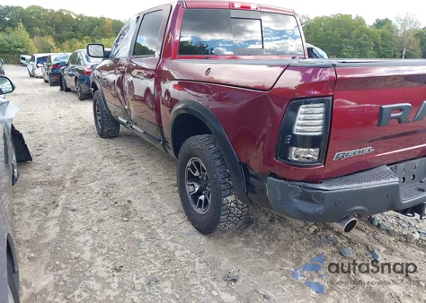 2017 Ram 1500 Rebel 4X4 5'7 Box z USA, uszkodzony, nr VIN 1C6RR7YT0HS779251